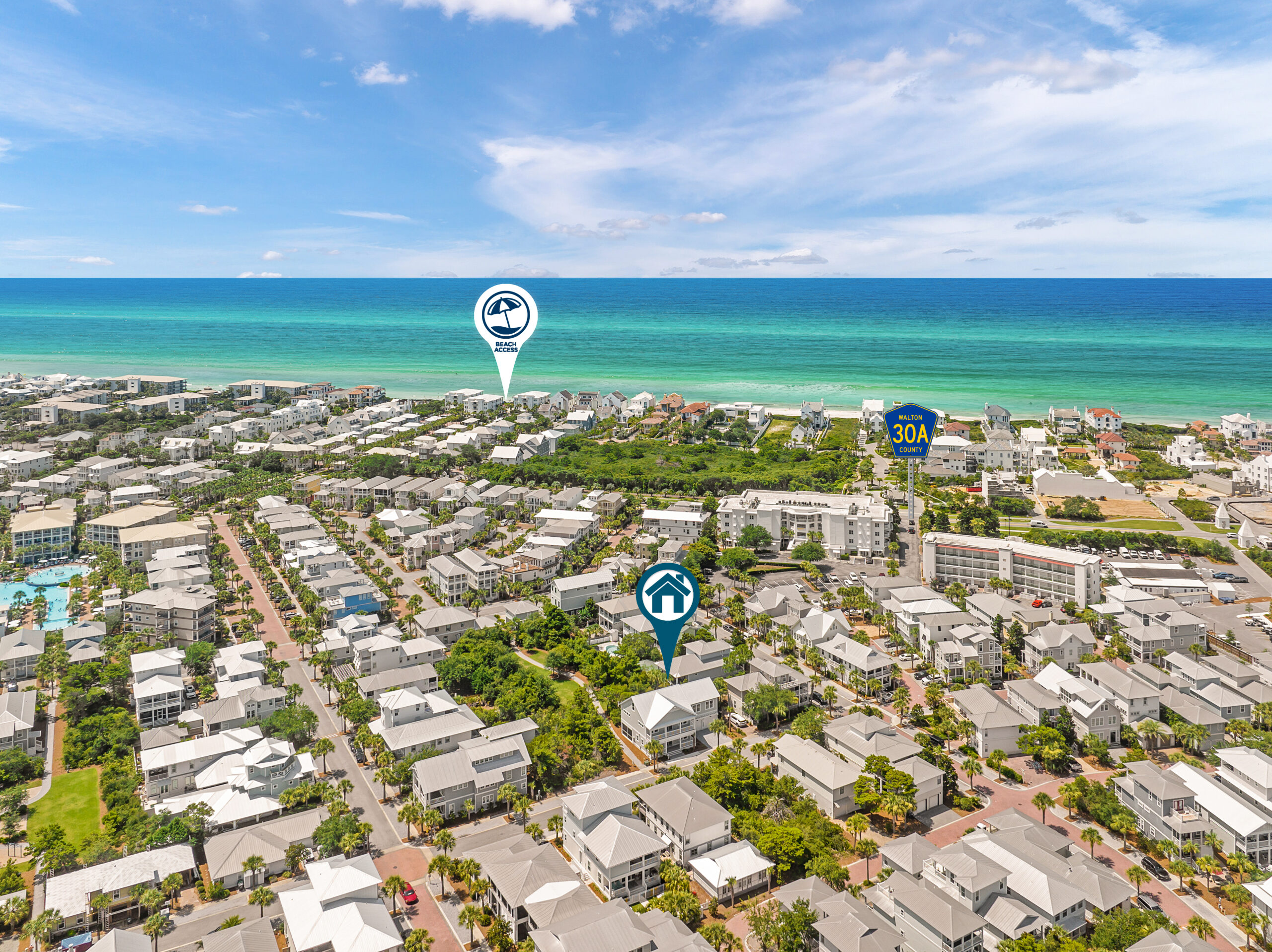An aerial showing a home in relation to the Gulf.